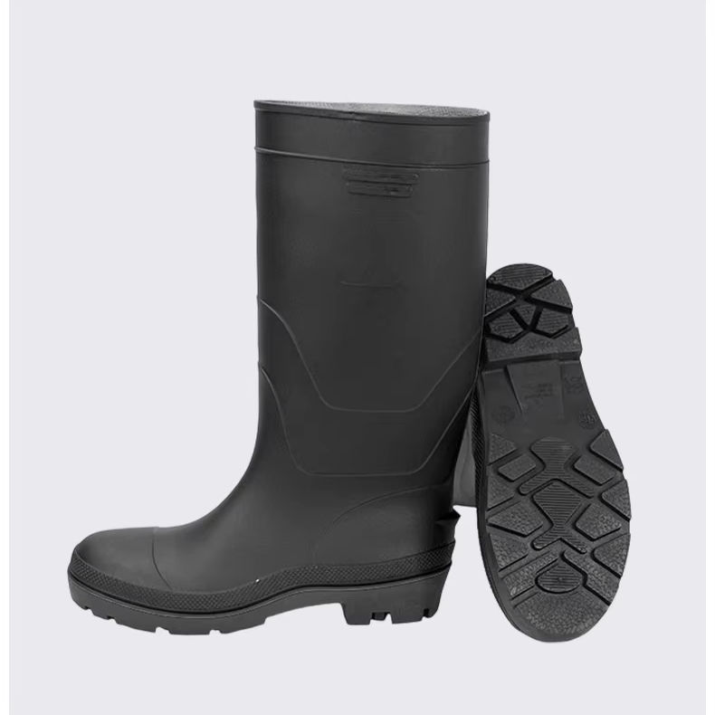 Side view of a black waterproof men's fishing boot with non-slip outsole